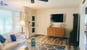 lakefront-cottage-living-room-glass-table-smart-tv-marion-illinois